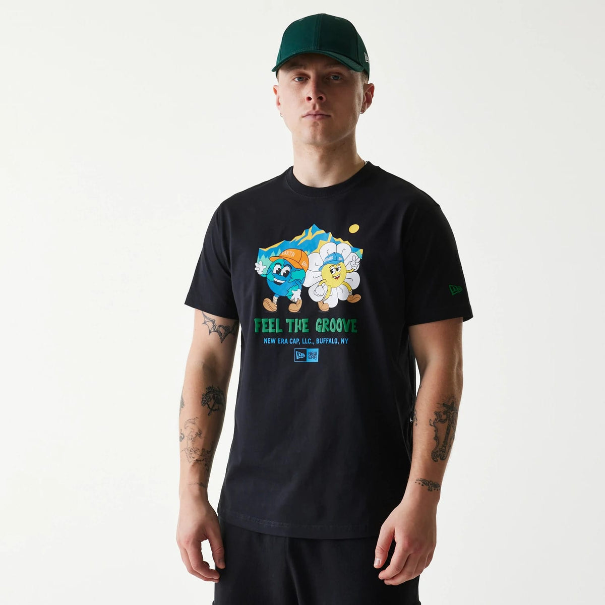 The Male model is wearing New Era Outdoor Earth Day Black T-Shirt 1