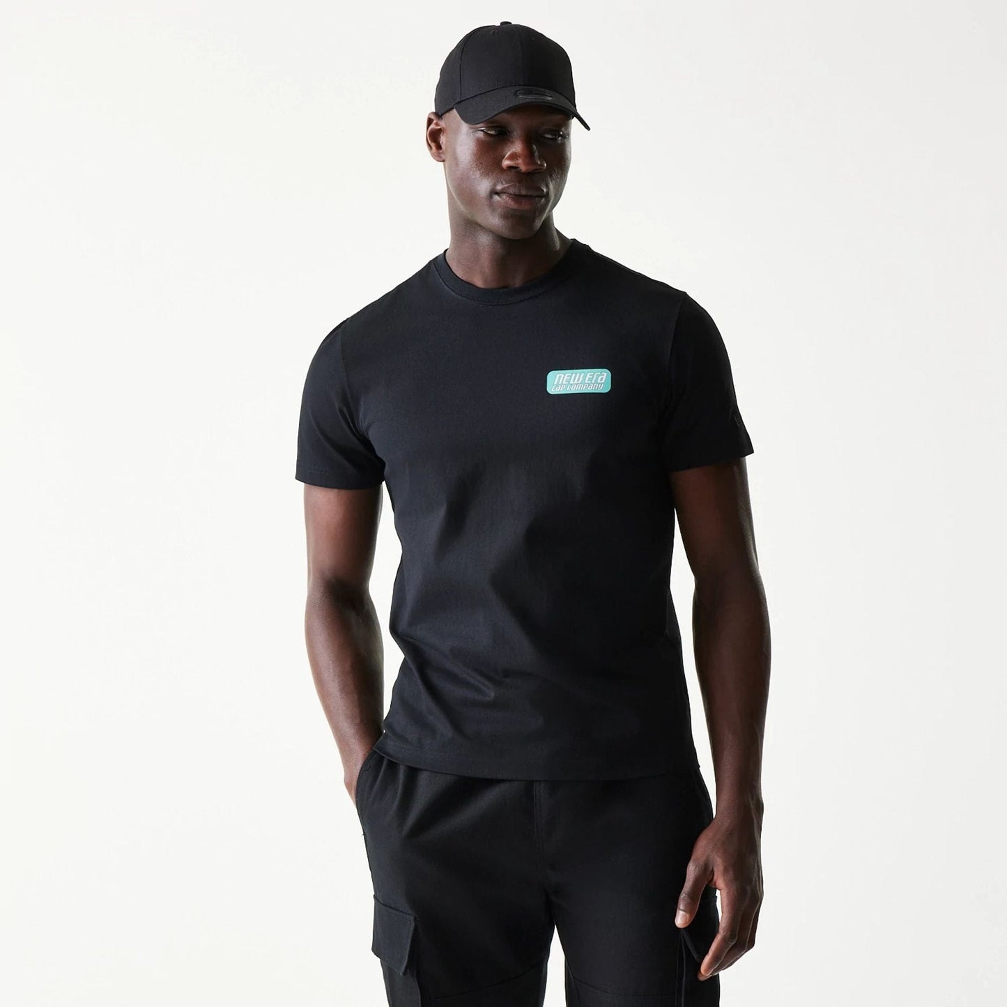 The Male model is wearing New Era Classic Black T-Shirt 1