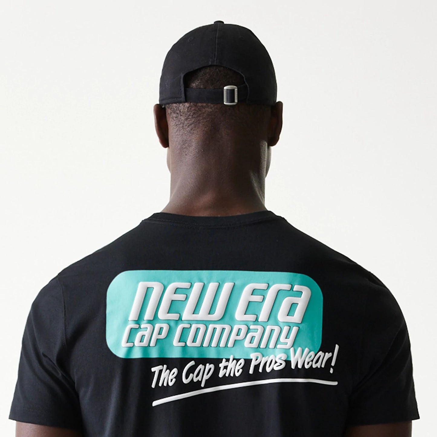 The Male model is wearing New Era Classic Black T-Shirt 6