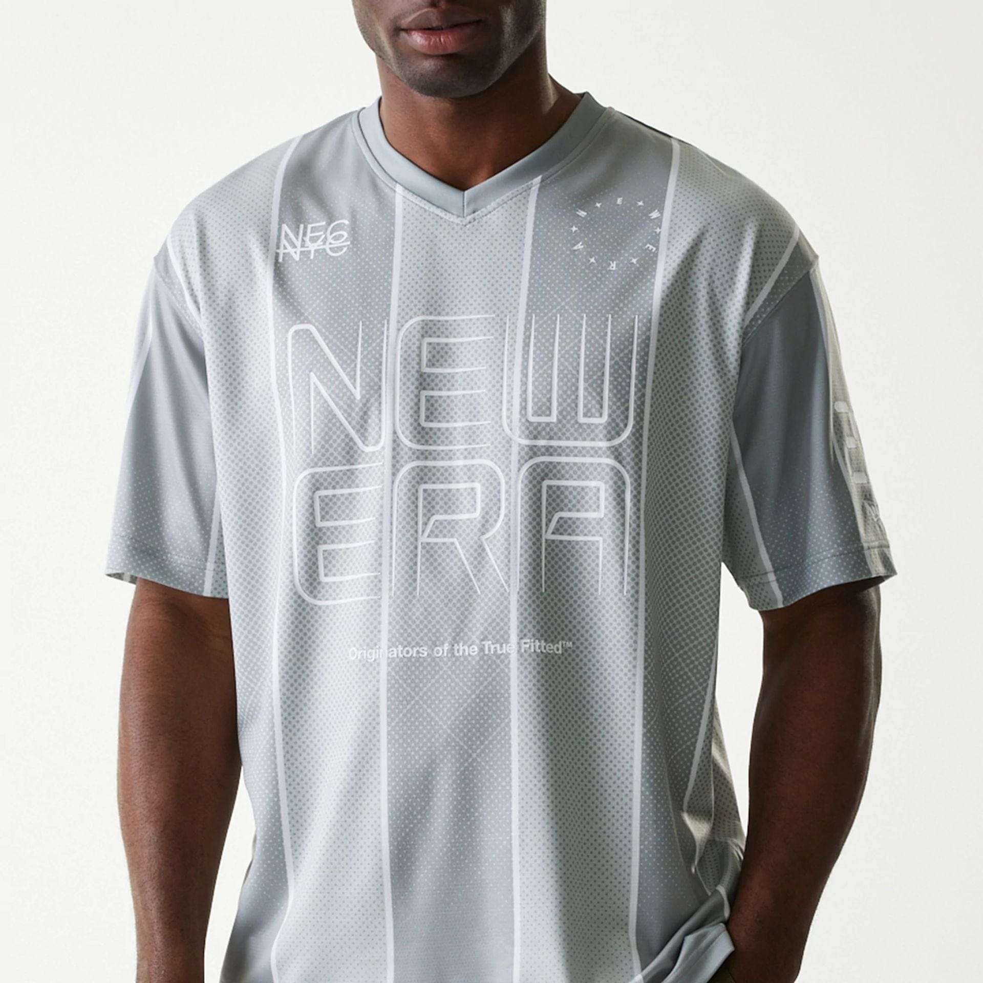The Male model is wearing New Era City Sport Grey T-Shirt 3