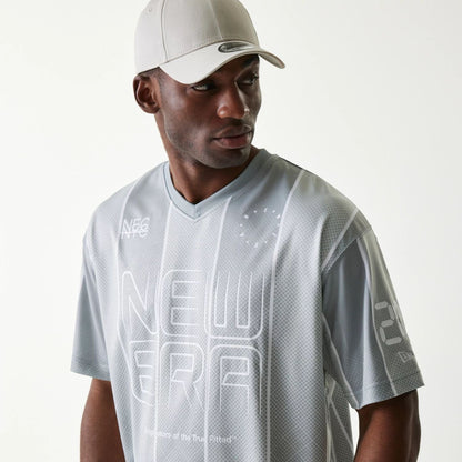 The Male model is wearing New Era City Sport Grey T-Shirt 4