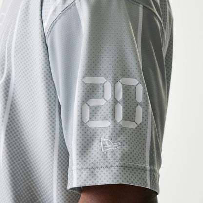 The Male model is wearing New Era City Sport Grey T-Shirt 5