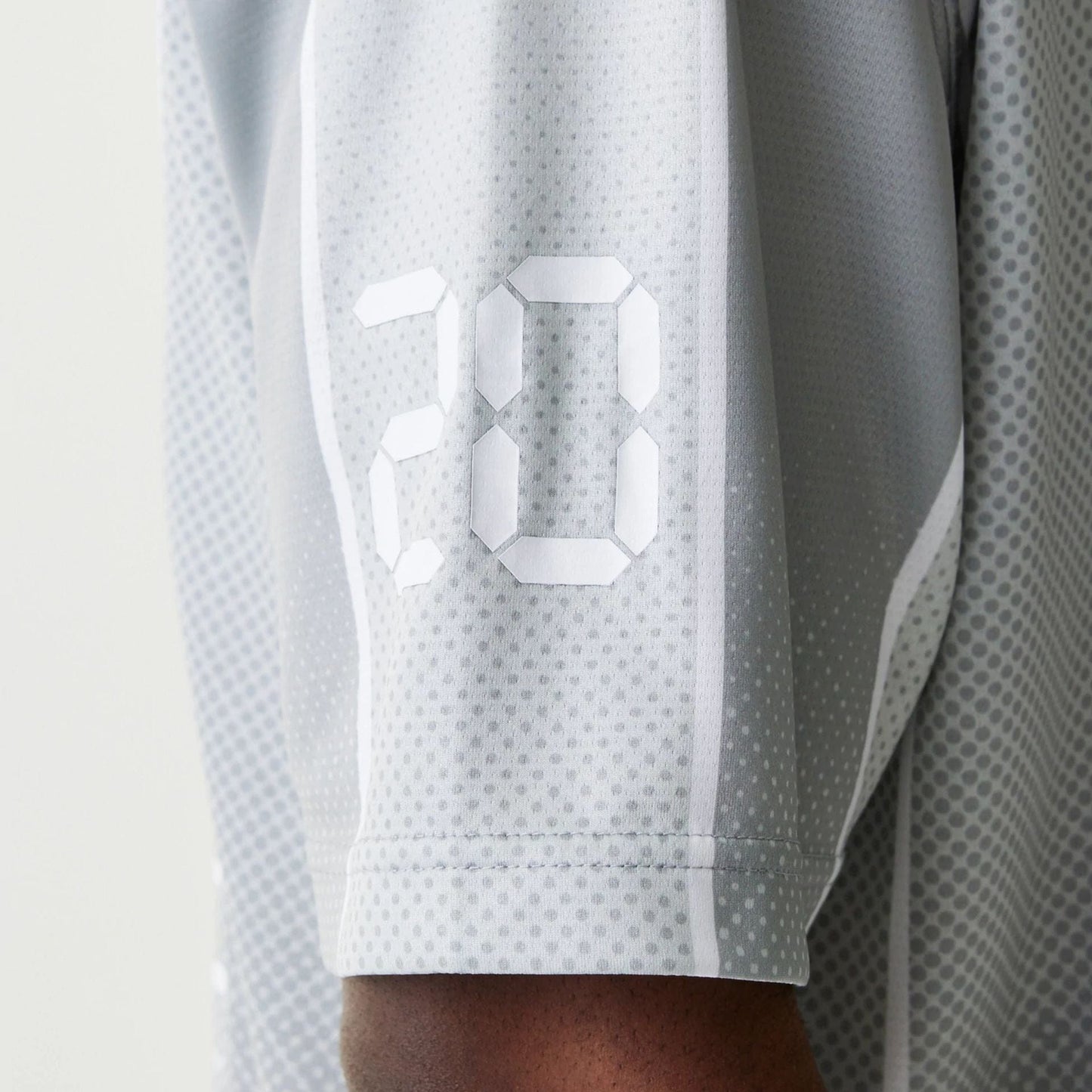 The Male model is wearing New Era City Sport Grey T-Shirt 6