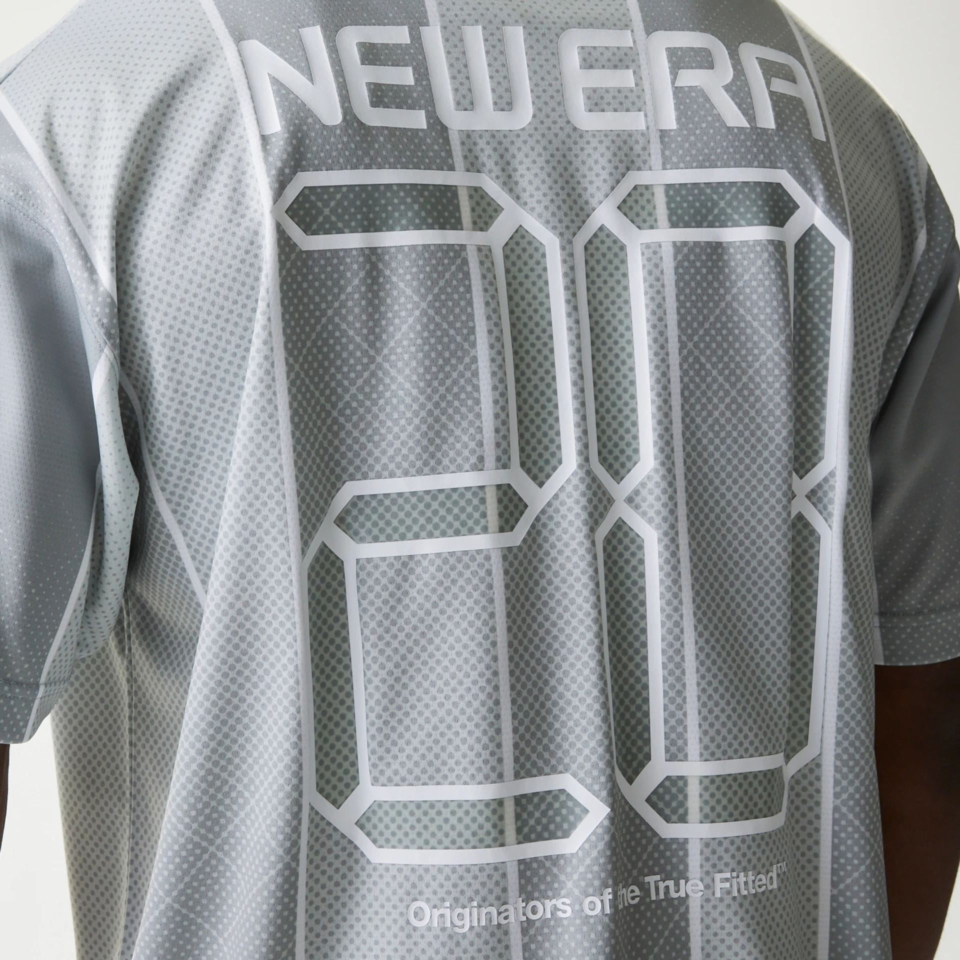 The Male model is wearing New Era City Sport Grey T-Shirt 7