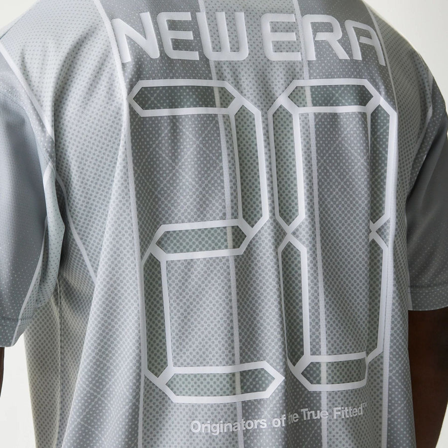 The Male model is wearing New Era City Sport Grey T-Shirt 7