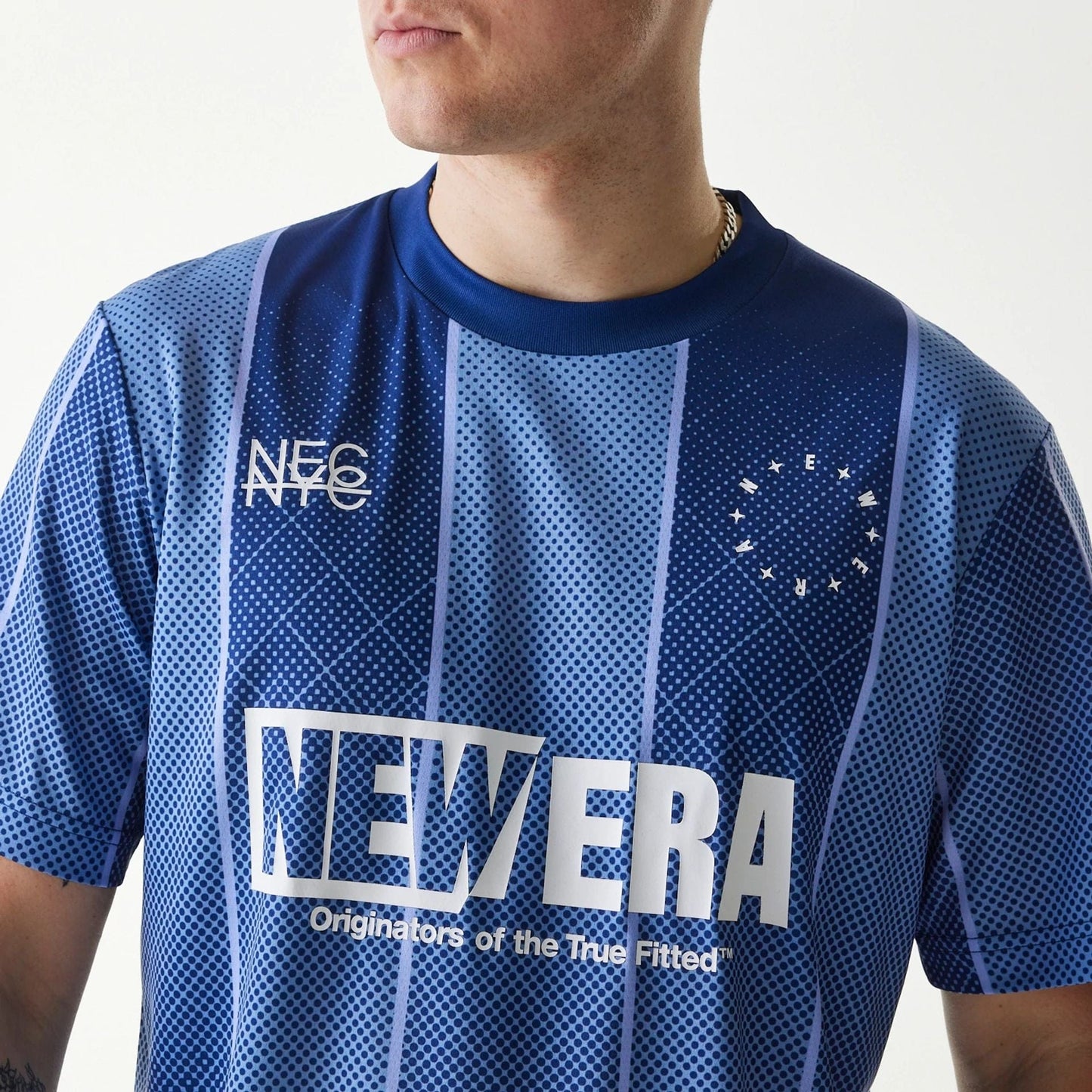 The Male model is wearing New Era City Sport Blue T-Shirt 3