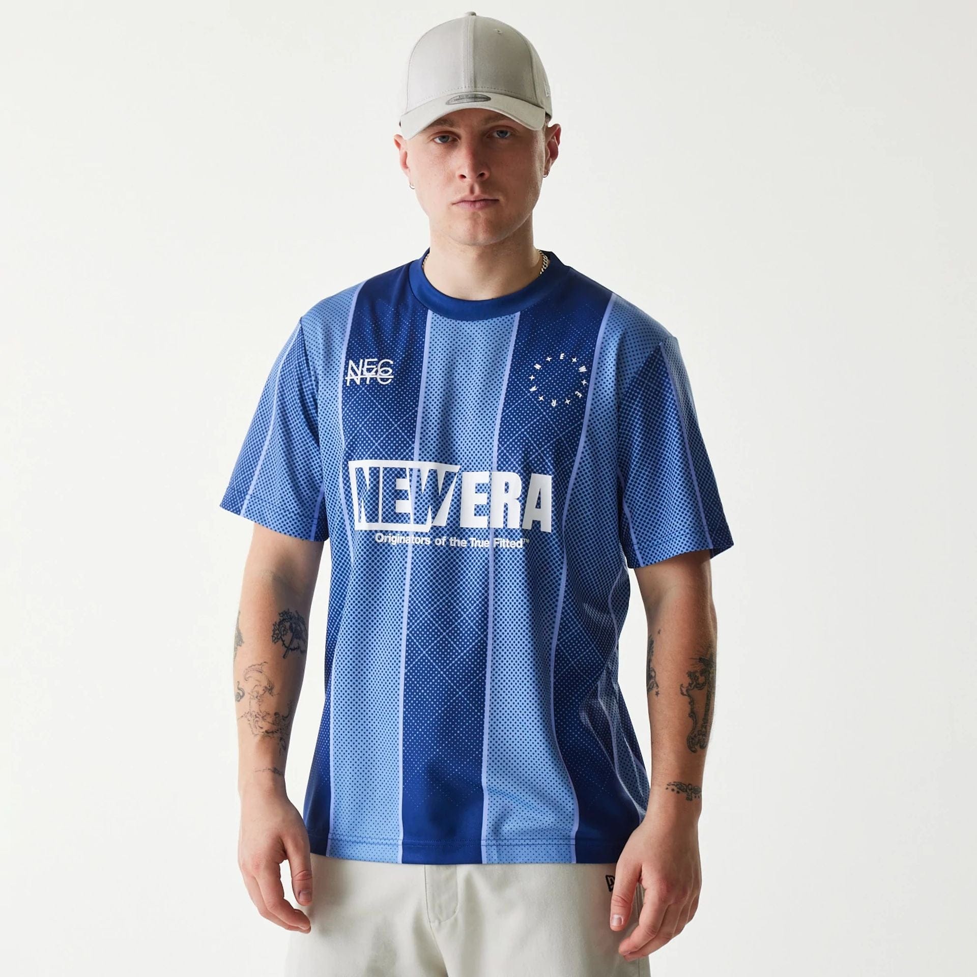 The Male model is wearing New Era City Sport Blue T-Shirt 1