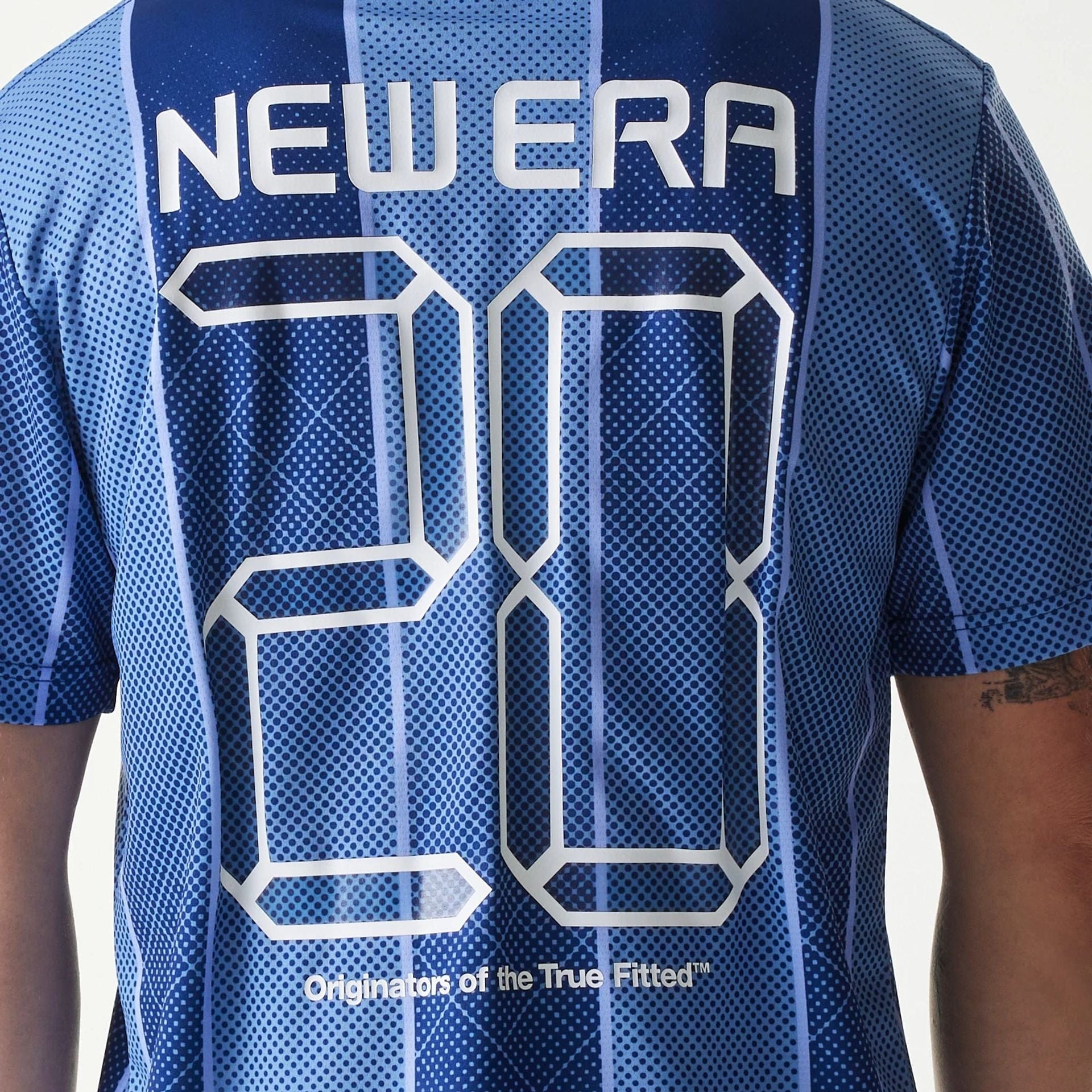 The Male model is wearing New Era City Sport Blue T-Shirt 5