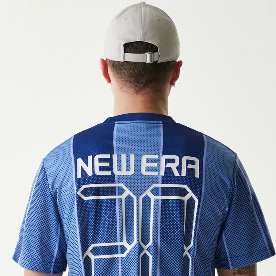 The Male model is wearing New Era City Sport Blue T-Shirt 6