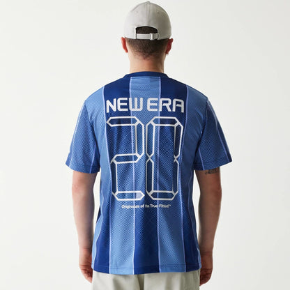 The Male model is wearing New Era City Sport Blue T-Shirt 2