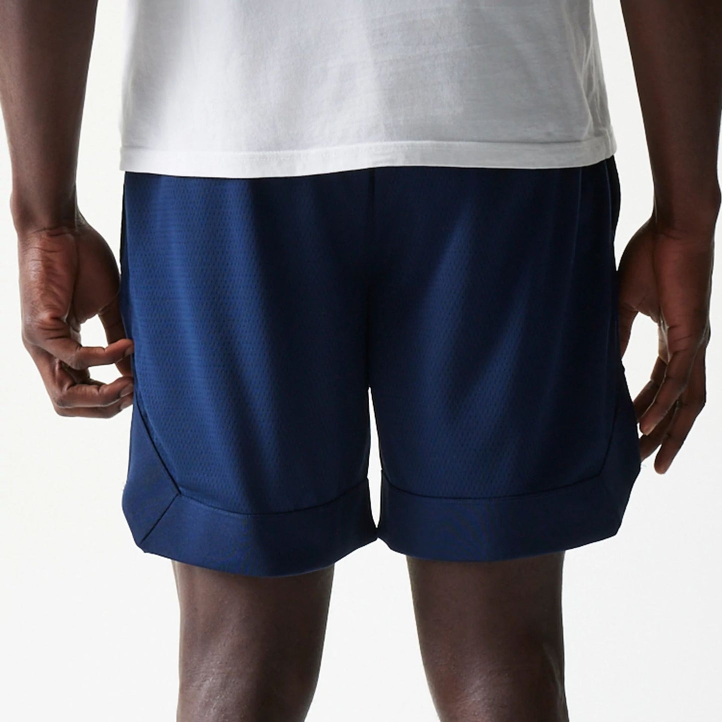 The Male model is wearing New York Yankees Tonal Pack Blue Shorts 7