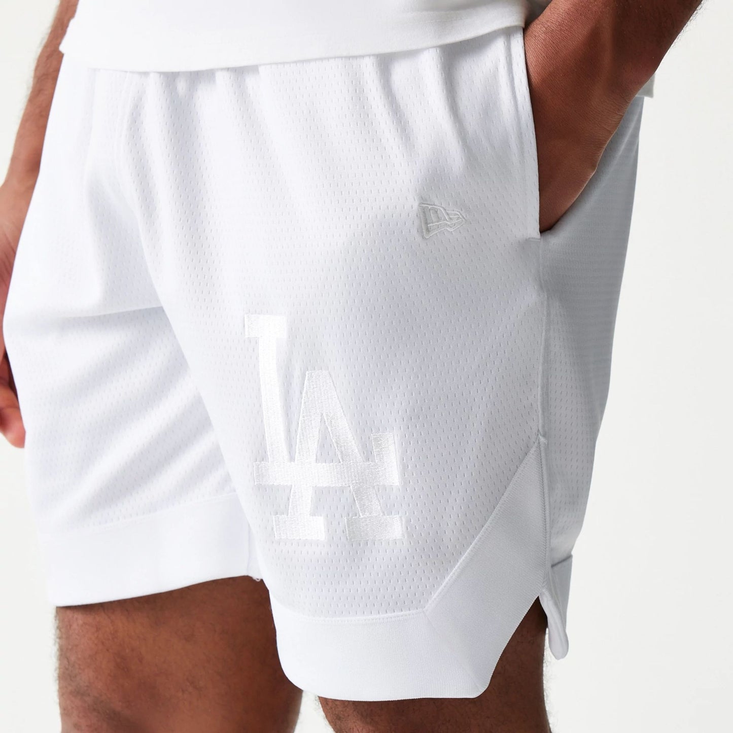 The Male model is wearing LA Dodgers Tonal Pack White Shorts 5