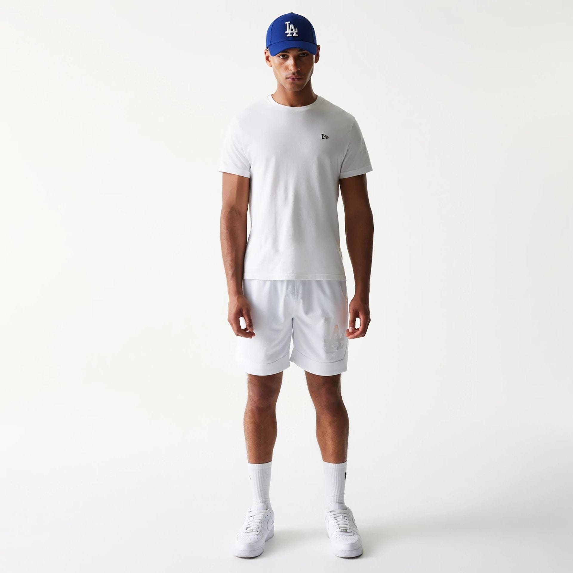The Male model is wearing LA Dodgers Tonal Pack White Shorts 8