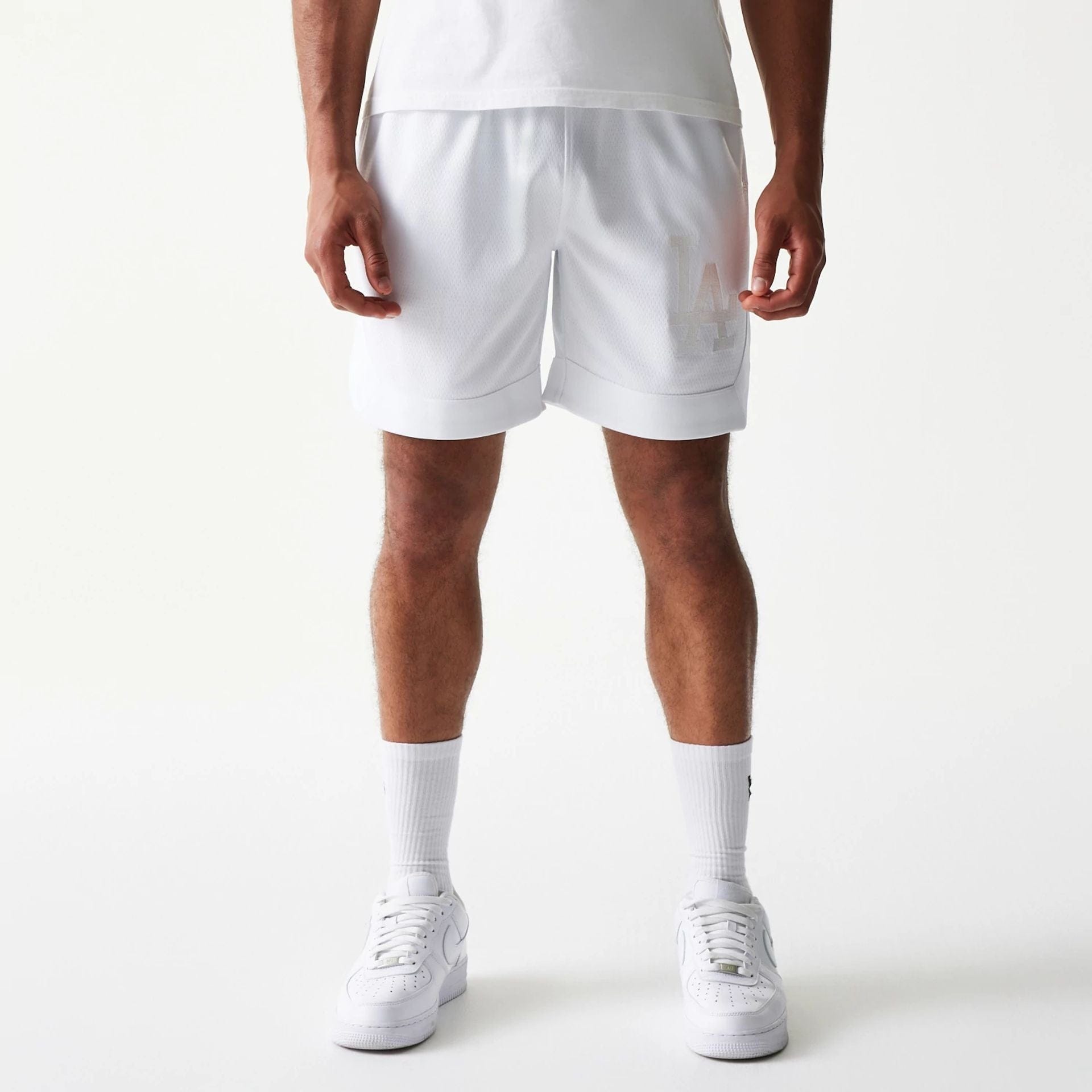 The Male model is wearing LA Dodgers Tonal Pack White Shorts 1