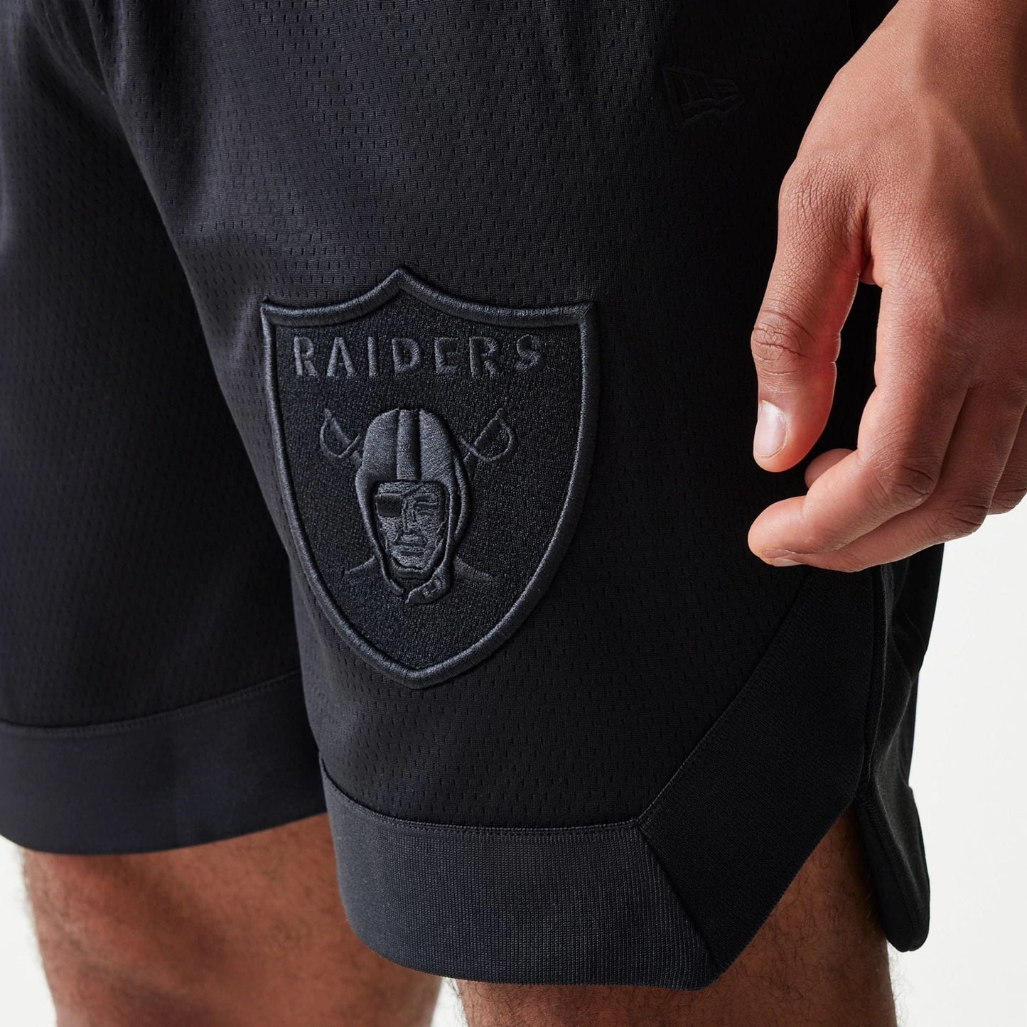 The Male model is wearing Las Vegas Raiders Tonal Pack Black Shorts 3