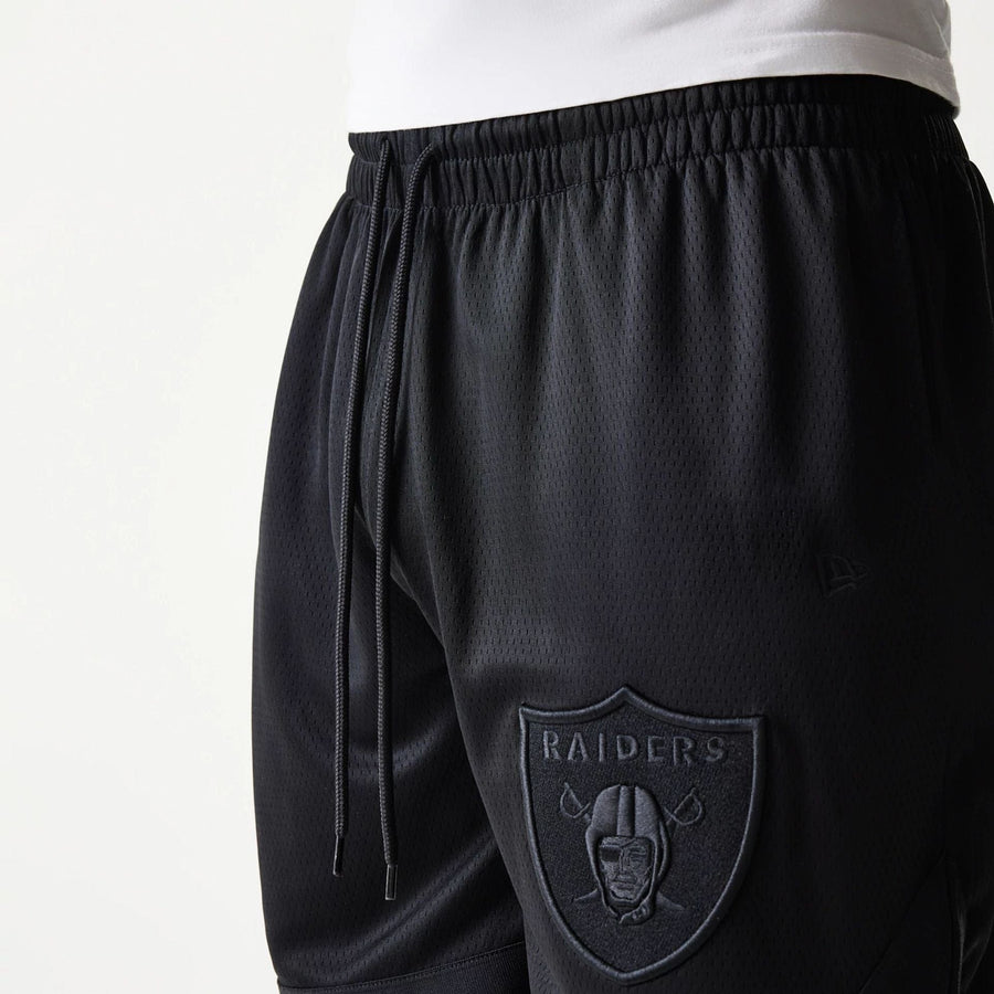 The Male model is wearing Las Vegas Raiders Tonal Pack Black Shorts 5