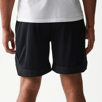 The Male model is wearing Las Vegas Raiders Tonal Pack Black Shorts 7