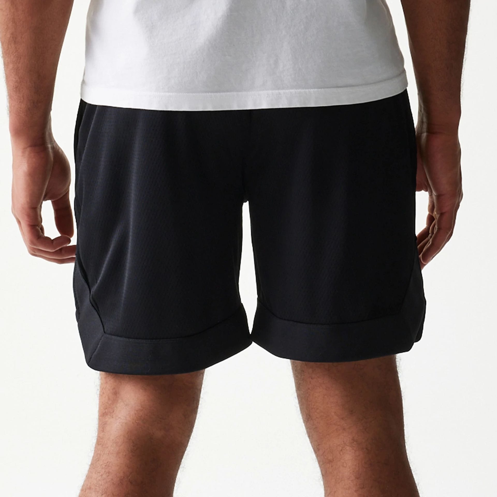 The Male model is wearing Las Vegas Raiders Tonal Pack Black Shorts 7