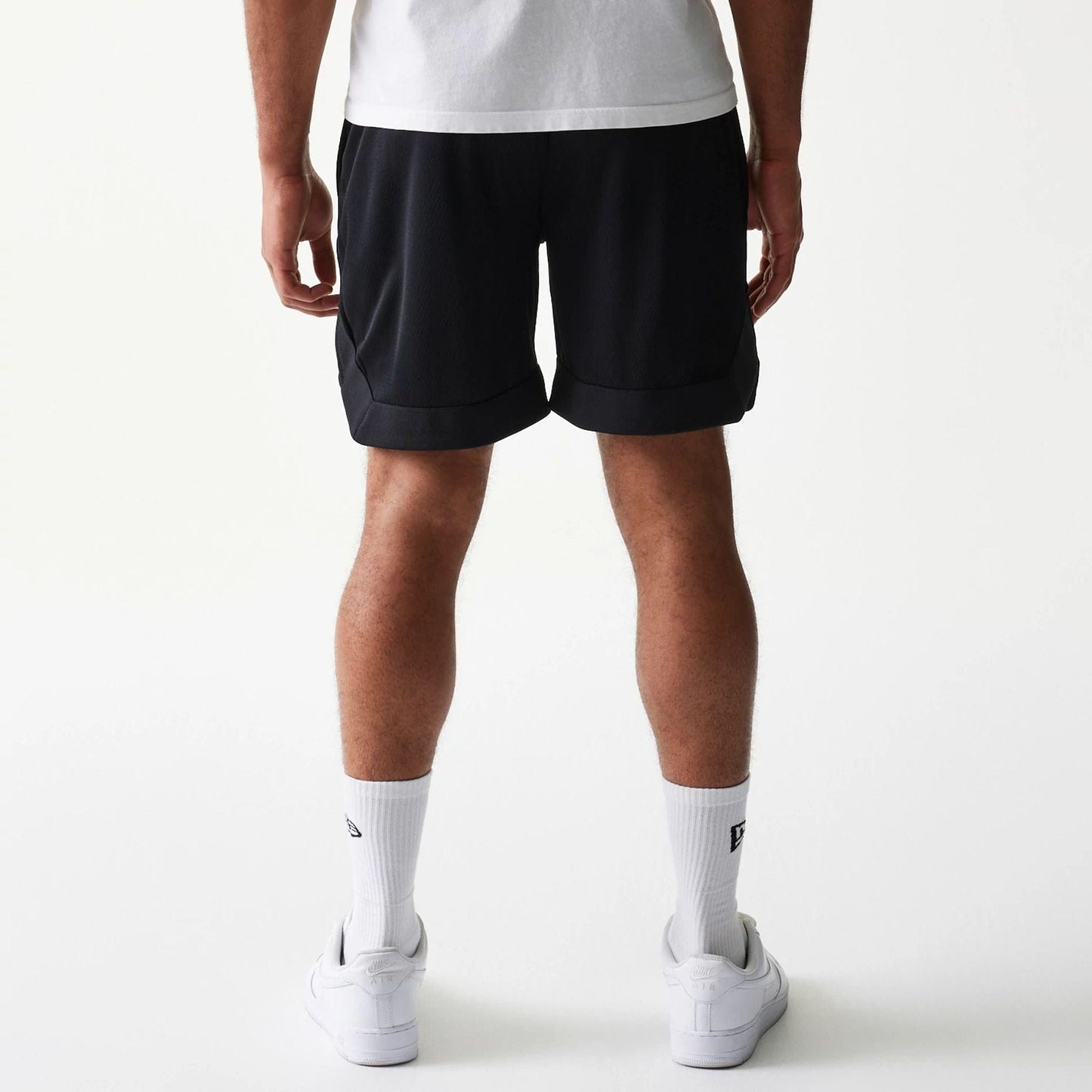 The Male model is wearing Las Vegas Raiders Tonal Pack Black Shorts 2