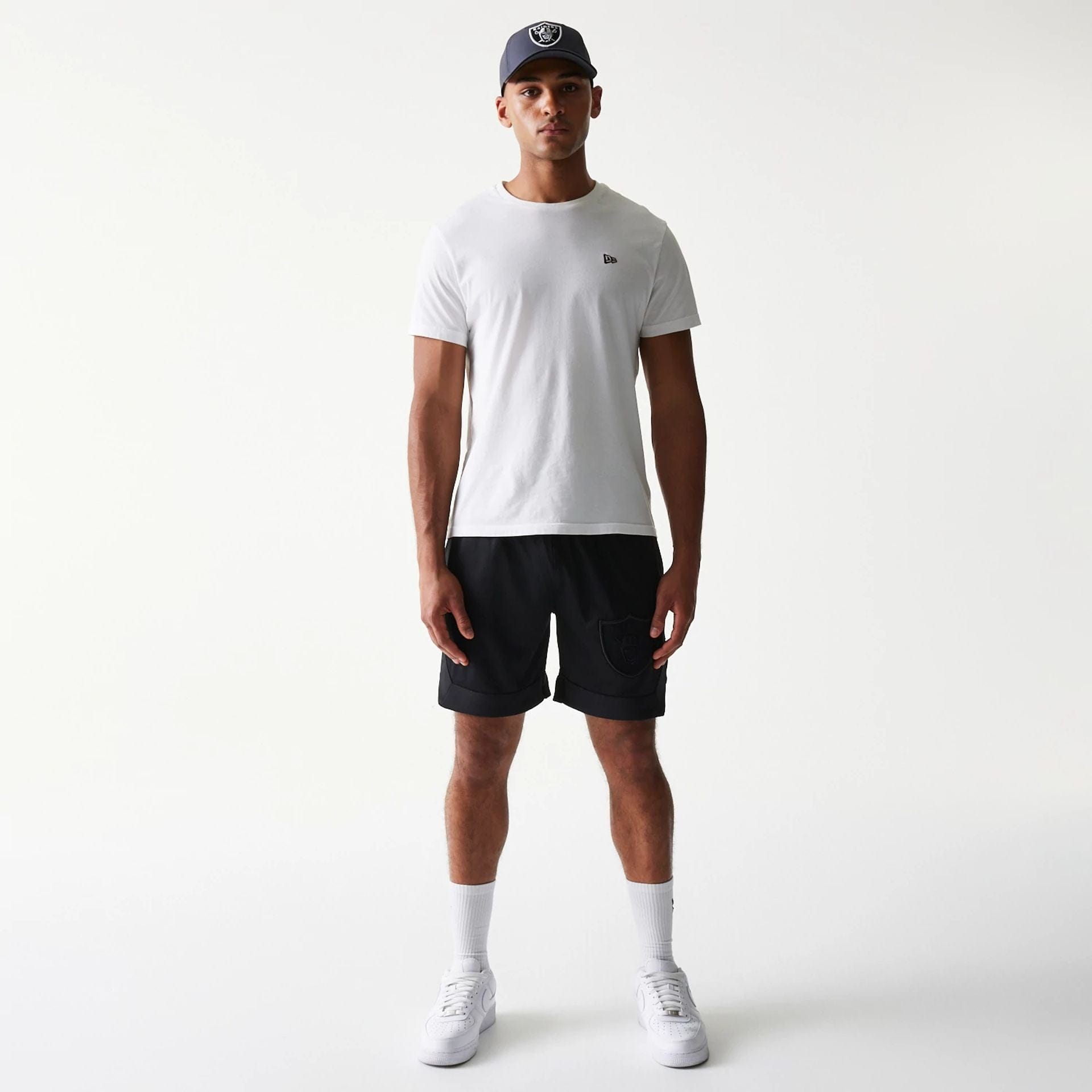 The Male model is wearing Las Vegas Raiders Tonal Pack Black Shorts 8
