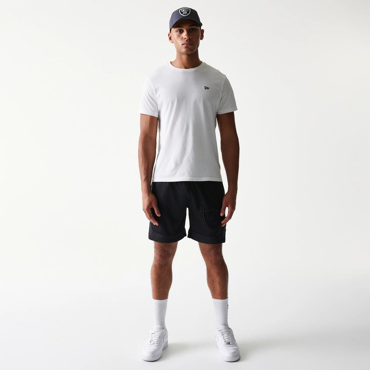 The Male model is wearing Las Vegas Raiders Tonal Pack Black Shorts 8