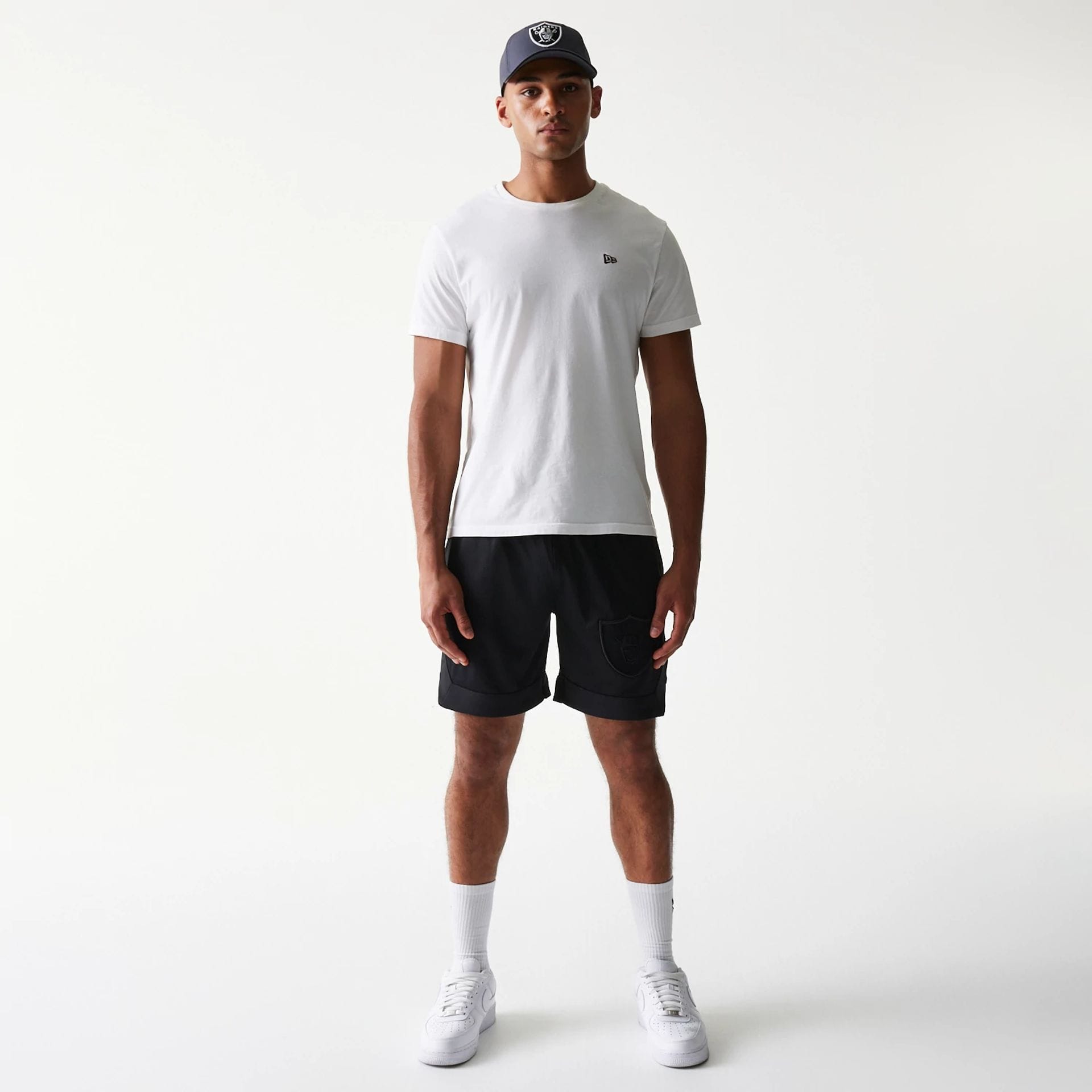 The Male model is wearing Las Vegas Raiders Tonal Pack Black Shorts 8