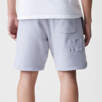 The Male model is wearing New Era Tonal Pack Grey Shorts 7
