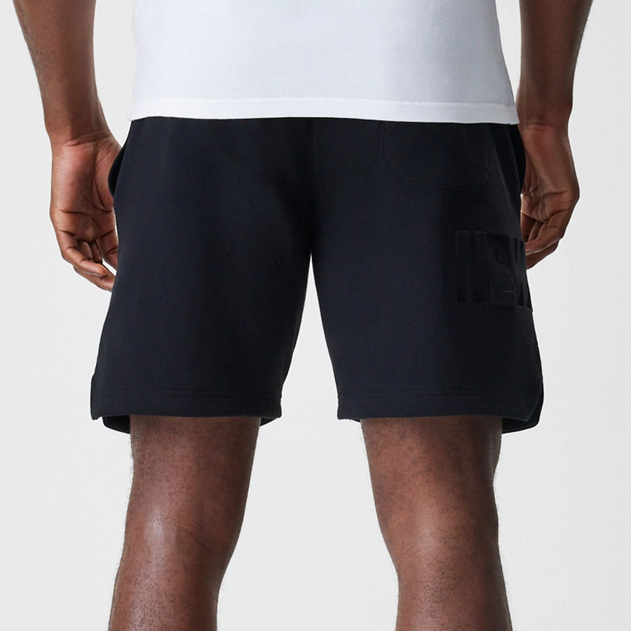 The Male model is wearing New Era Tonal Pack Black Shorts 6
