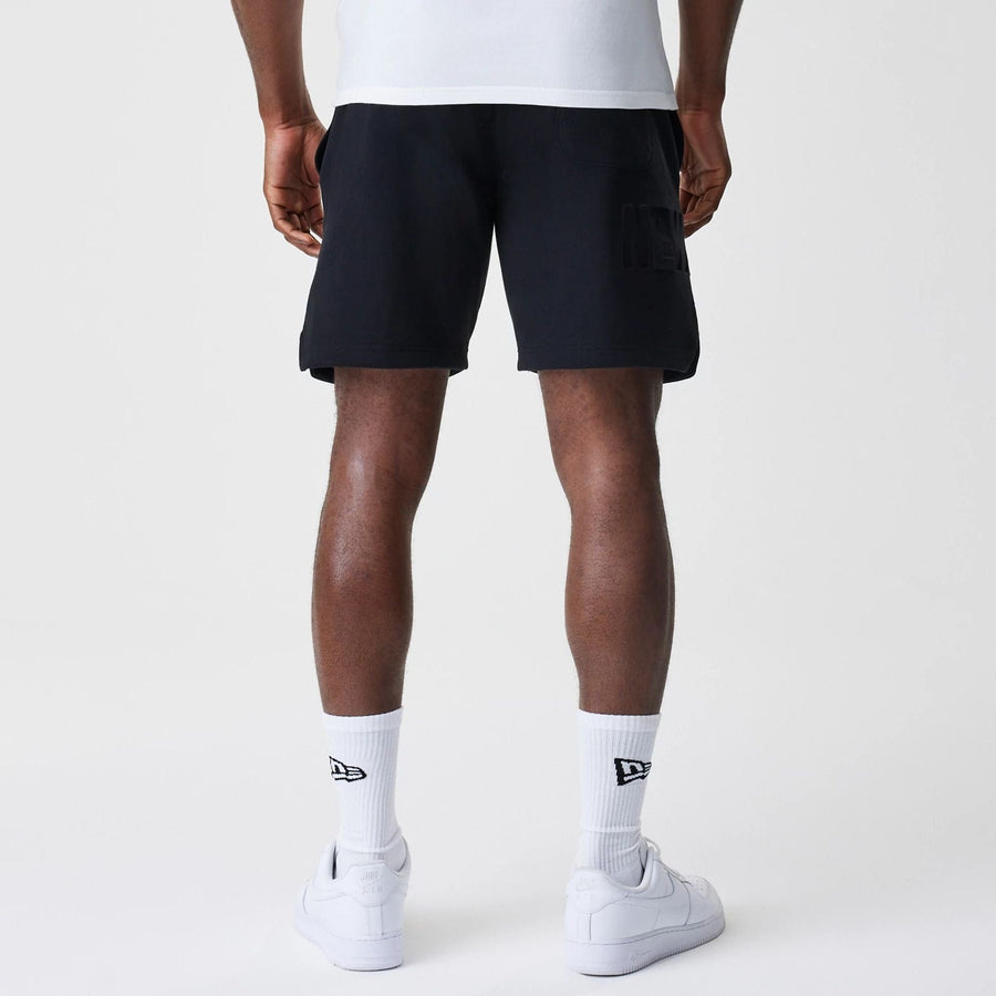 The Male model is wearing New Era Tonal Pack Black Shorts 7