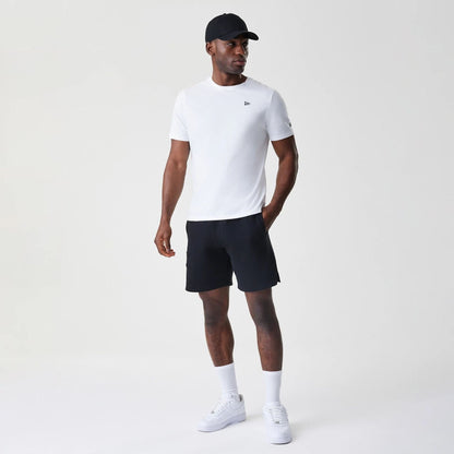 The Male model is wearing New Era Tonal Pack Black Shorts 8