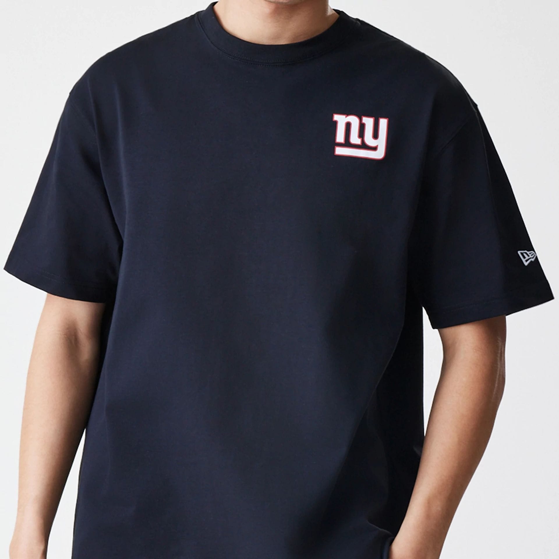 The Male model is wearing New York Giants NFL Black Oversized T-Shirt 4