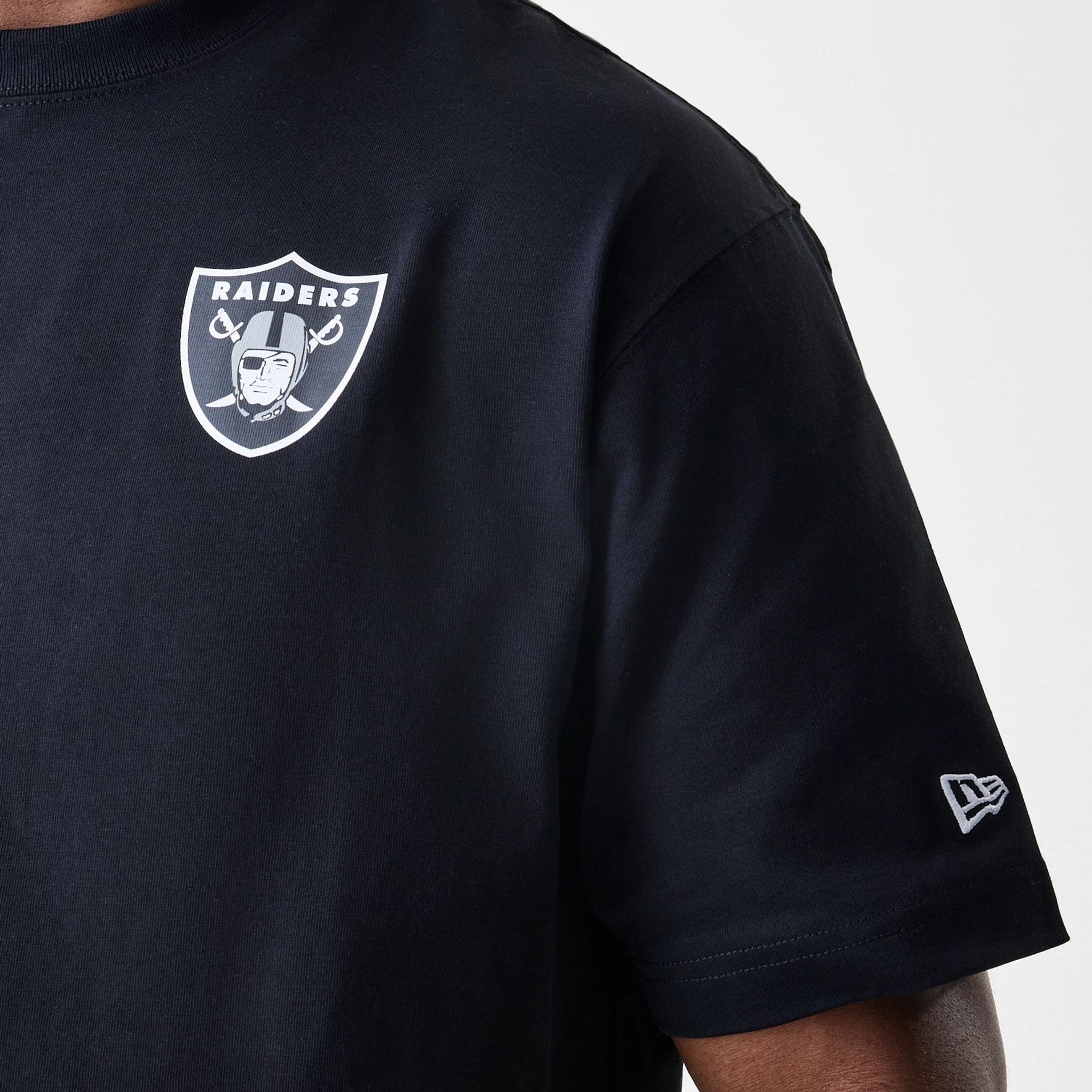 The Male model is wearing Las Vegas Raiders NFL Black Oversized T-Shirt 4