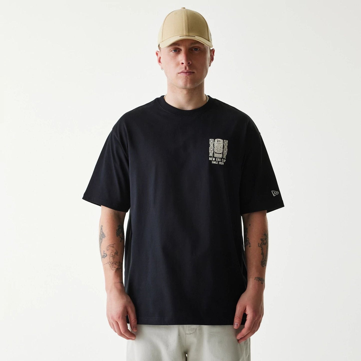 The Male model is wearing New Era Marine Life Club Black Oversized T-Shirt 1
