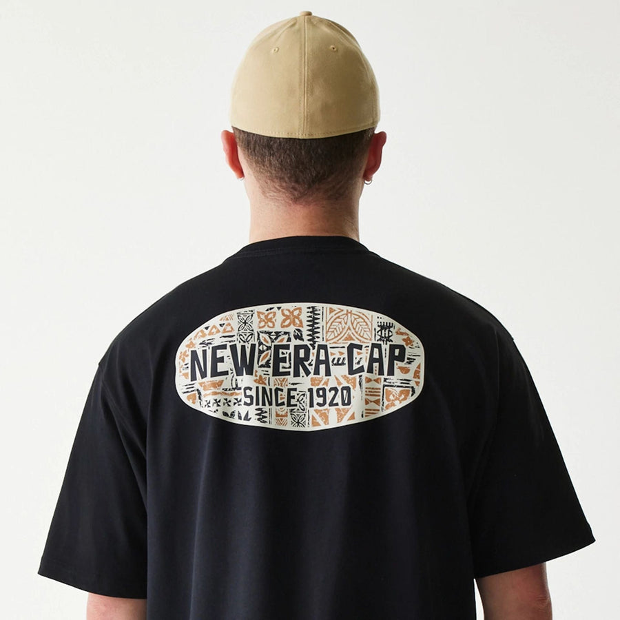 The Male model is wearing New Era Marine Life Club Black Oversized T-Shirt 6