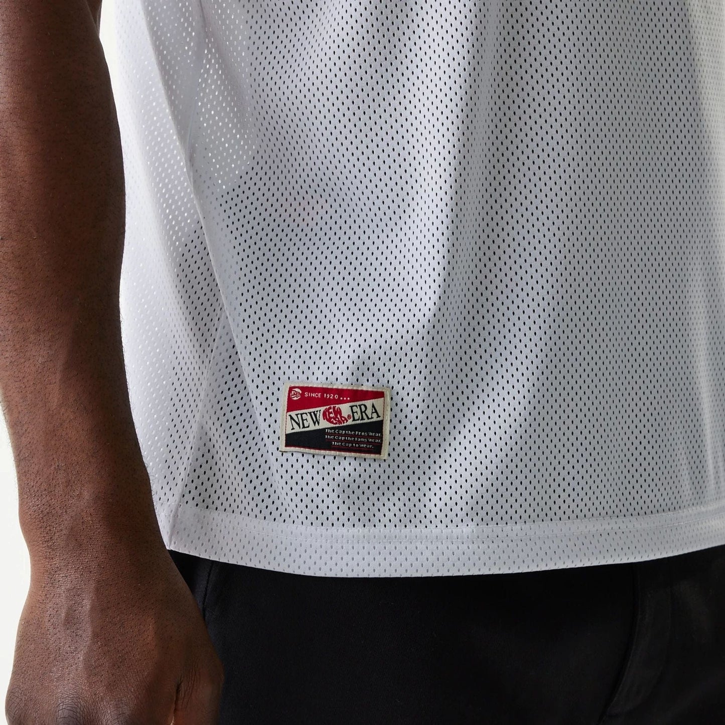 The Male model is wearing New Era Retro Sports White Mesh Jersey 4