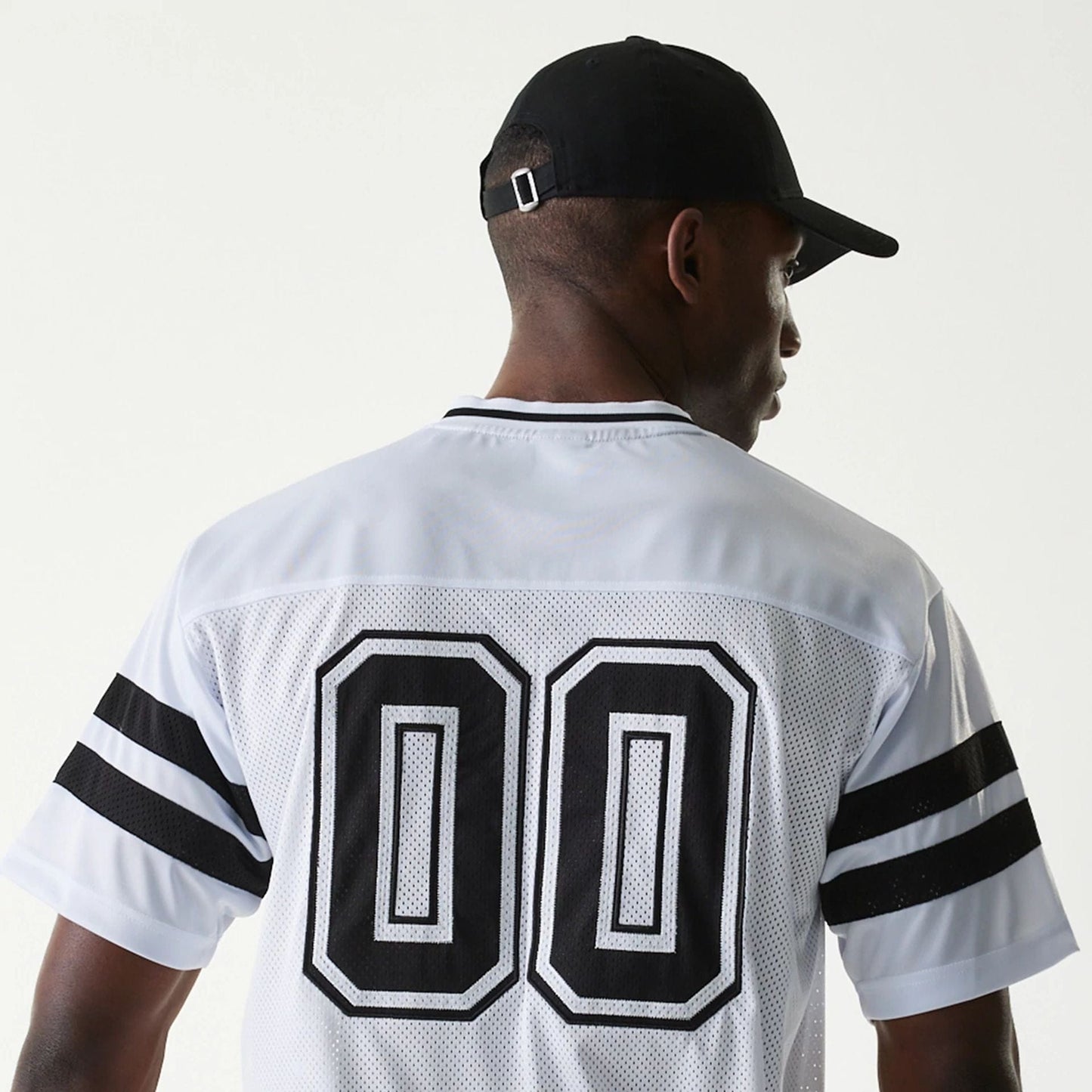 The Male model is wearing New Era Retro Sports White Mesh Jersey 5