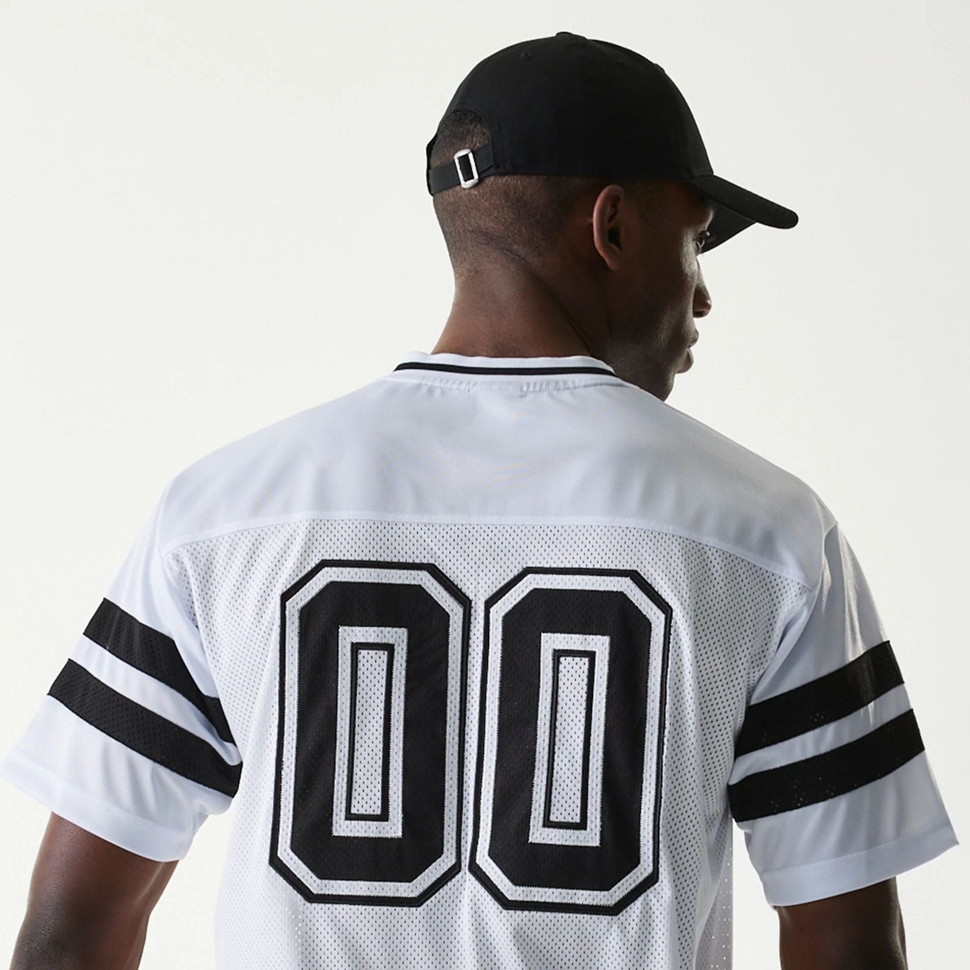 The Male model is wearing New Era Retro Sports White Mesh Jersey 5