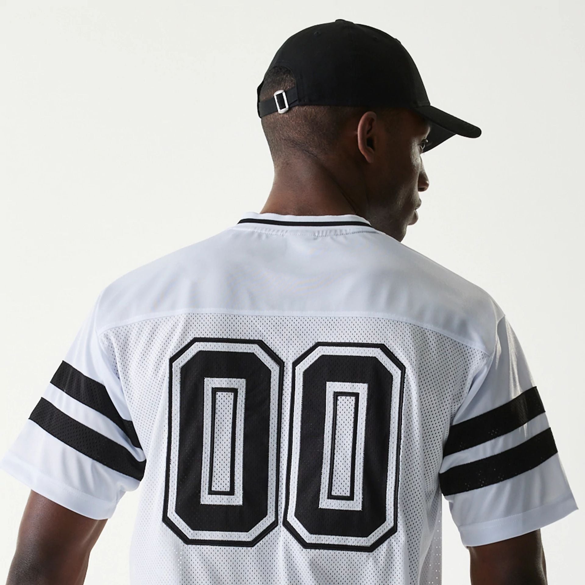 The Male model is wearing New Era Retro Sports White Mesh Jersey 5