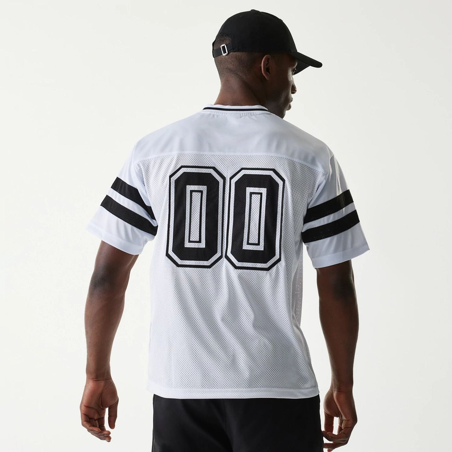 The Male model is wearing New Era Retro Sports White Mesh Jersey 2