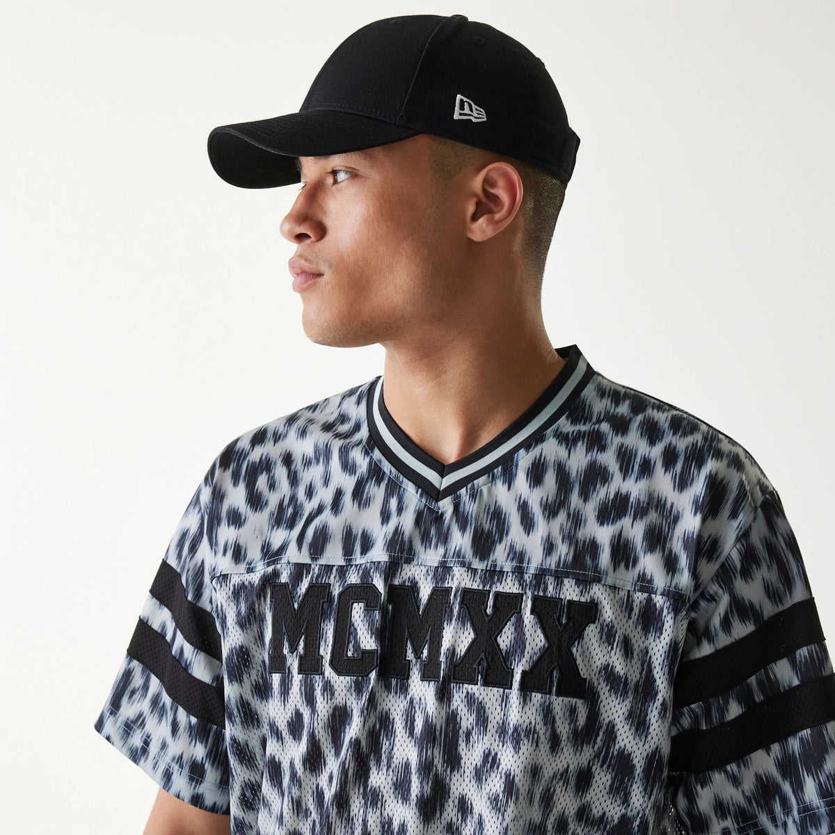 The Male model is wearing New Era Retro Sports Grey Mesh Jersey 6
