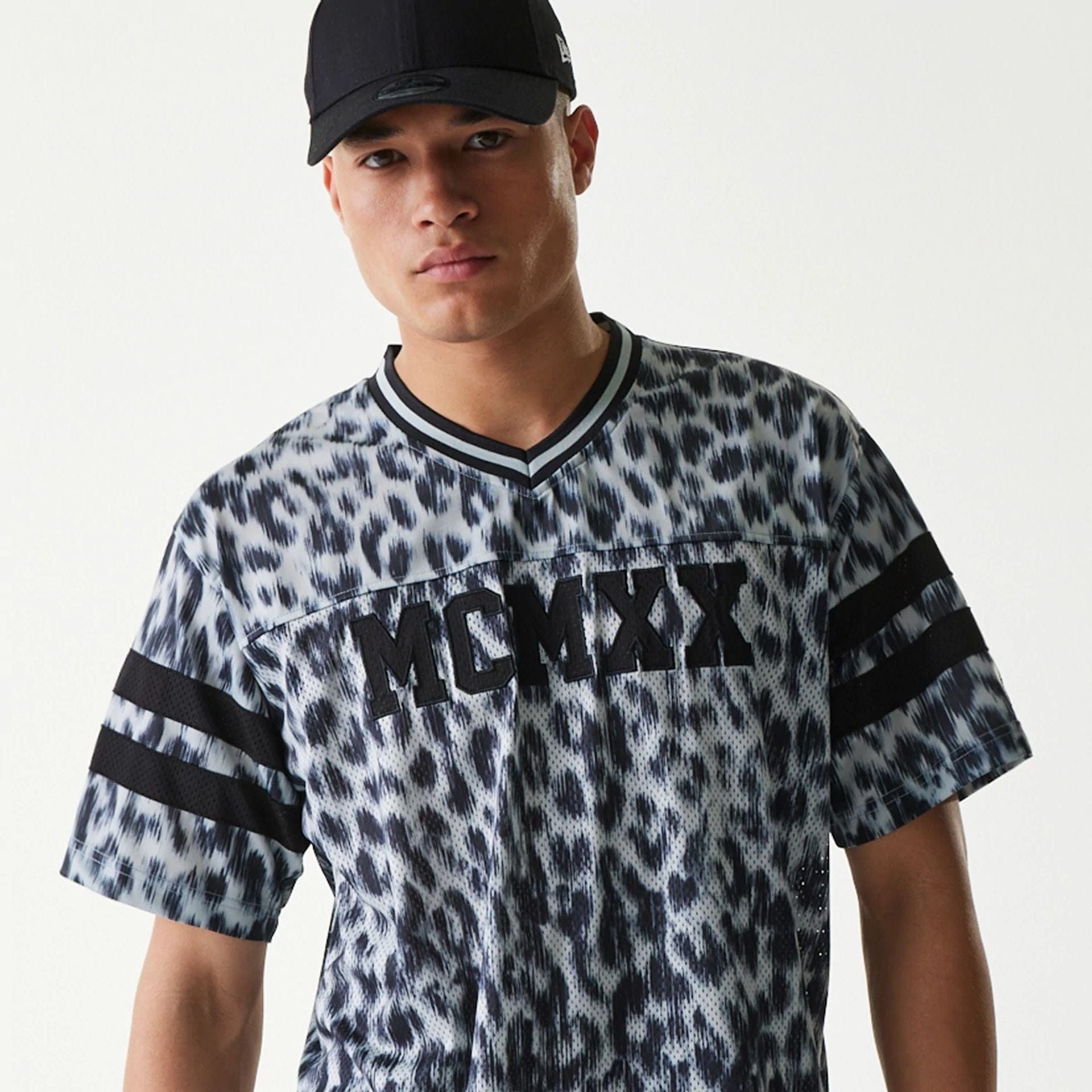 The Male model is wearing New Era Retro Sports Grey Mesh Jersey 3