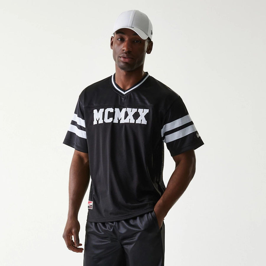 The Male model is wearing New Era Retro Sports Black Mesh Jersey 7