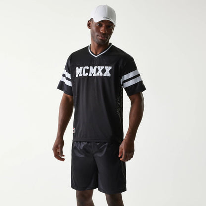 The Male model is wearing New Era Retro Sports Black Mesh Jersey 1
