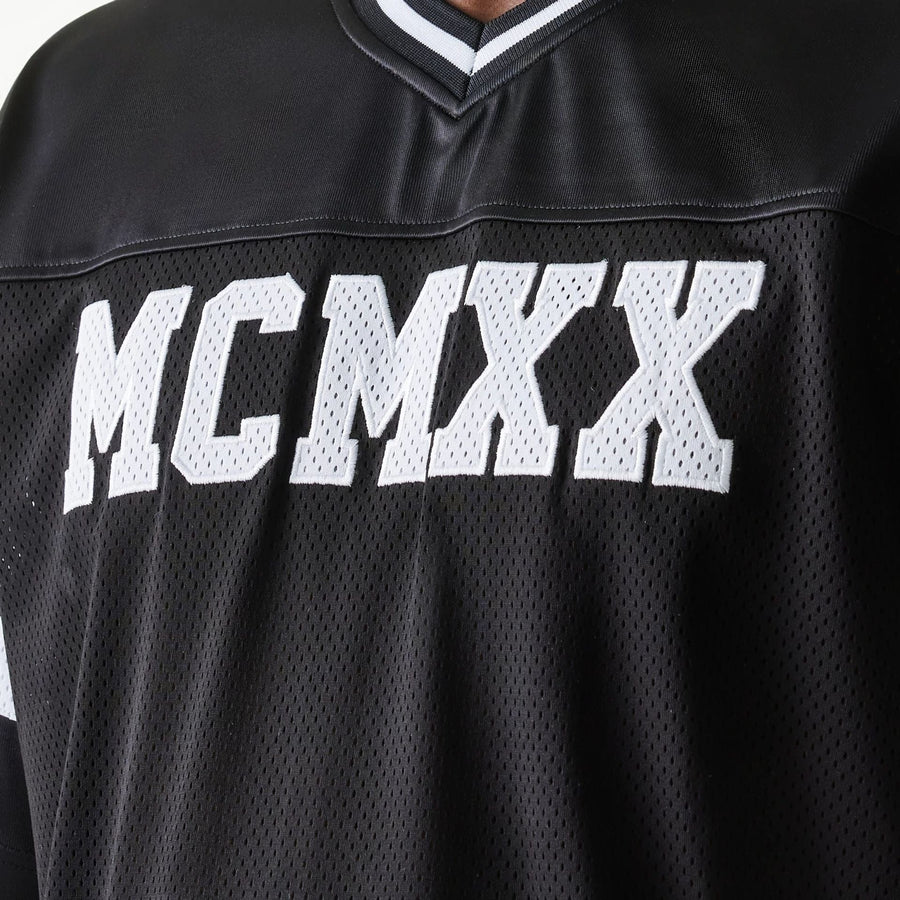 The Male model is wearing New Era Retro Sports Black Mesh Jersey 5