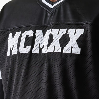 The Male model is wearing New Era Retro Sports Black Mesh Jersey 5