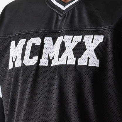 The Male model is wearing New Era Retro Sports Black Mesh Jersey 5