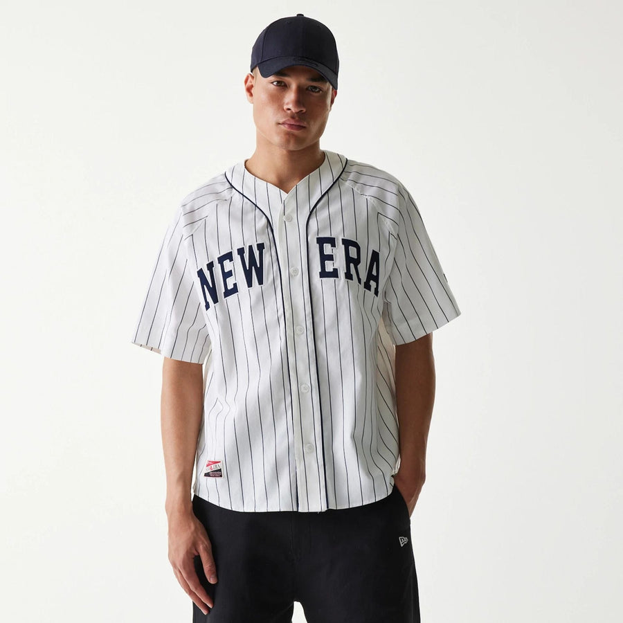 The Male model is wearing New Era Retro Baseball White Short Sleeve Shirt 1