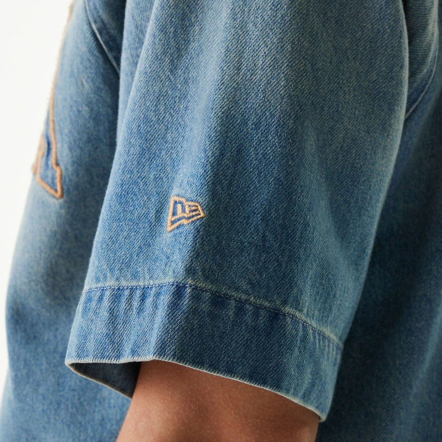 The Male model is wearing New Era Retro Baseball Blue Short Sleeve Shirt 6