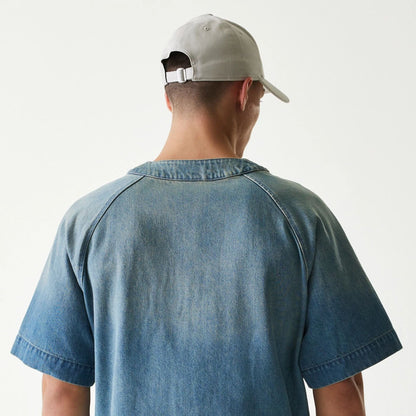 The Male model is wearing New Era Retro Baseball Blue Short Sleeve Shirt 7