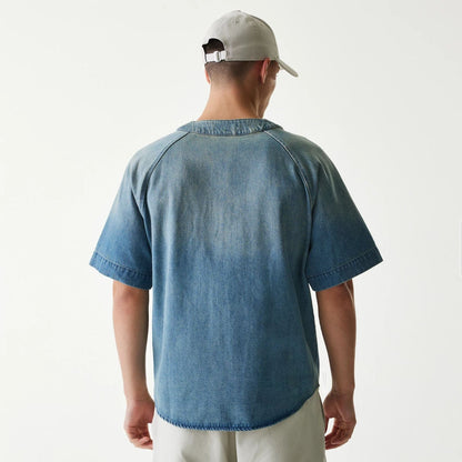 The Male model is wearing New Era Retro Baseball Blue Short Sleeve Shirt 2